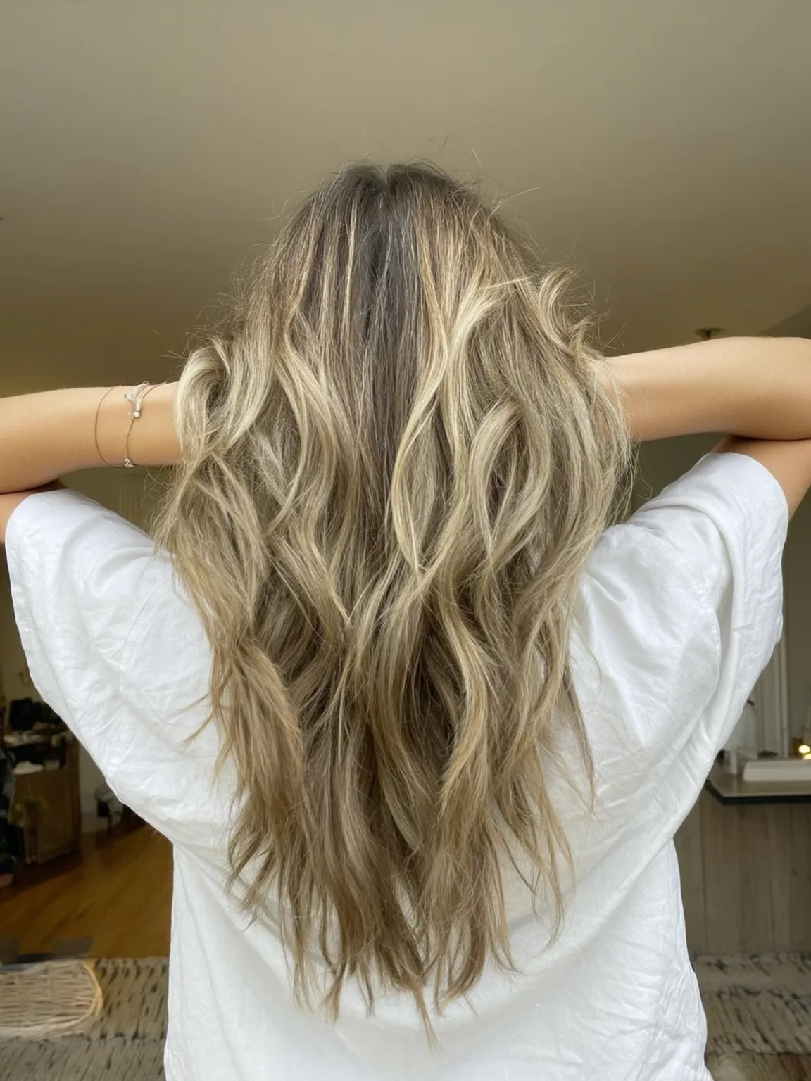 Medium Volume Honey Blonde Balayage Wavy Long Layers